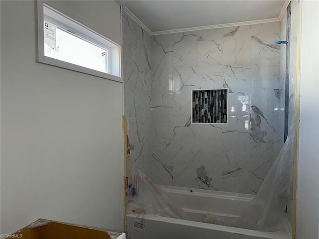 bathroom featuring shower / bathtub combination with curtain and ornamental molding