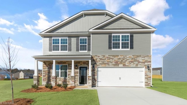 3834 Colt Ct, Trinity, NC 27370 - craftsman-style home featuring stone siding, a front lawn, driveway, and an attached garage