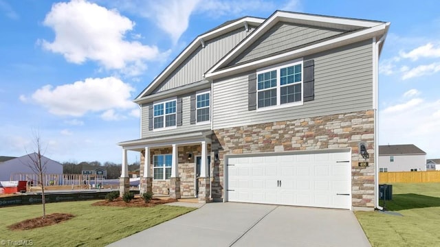 3834 Colt Ct, Trinity, NC 27370 - craftsman inspired home featuring stone siding, driveway, a porch, an attached garage, and board and batten siding