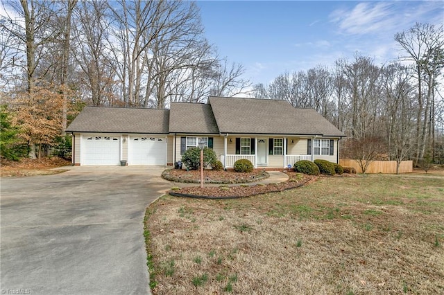 view of front facade featuring a garage, a shingled roof, concrete driveway, a porch, and a front lawn