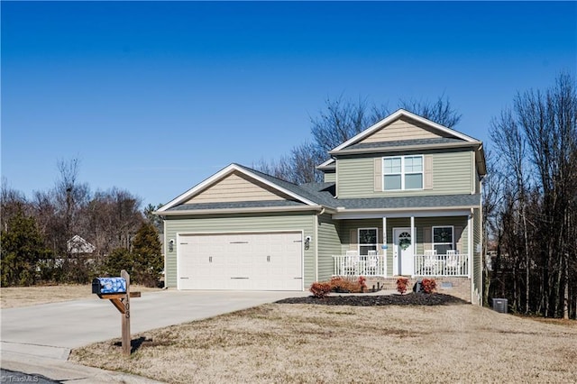 view of front of home with a garage and covered porch