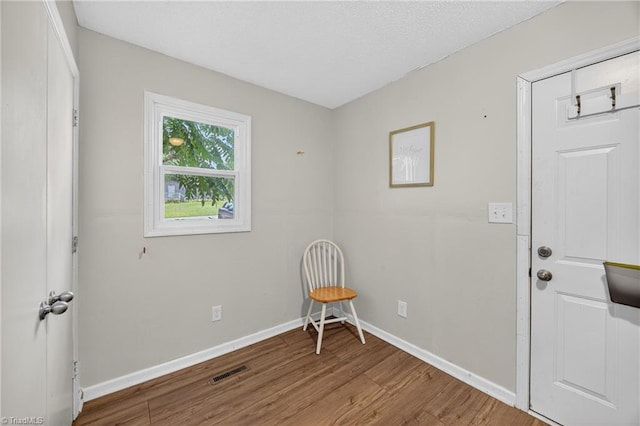 209 Brewer Cir, East Bend, NC 27018 - foyer entrance with wood finished floors and baseboards