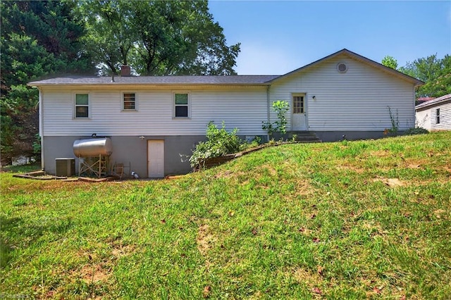 209 Brewer Cir, East Bend, NC 27018 - back of property featuring a yard and entry steps