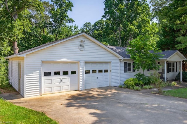 209 Brewer Cir, East Bend, NC 27018 - ranch-style house featuring asphalt driveway and a garage