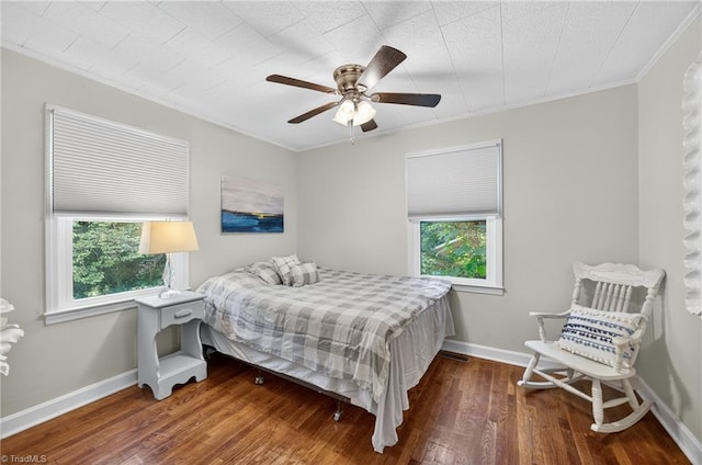 209 Brewer Cir, East Bend, NC 27018 - bedroom with hardwood / wood-style floors, crown molding, and ceiling fan