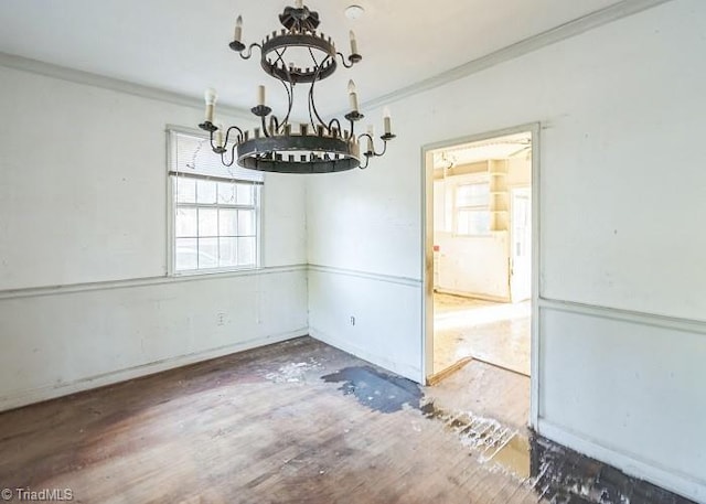 unfurnished dining area with wood-type flooring and ornamental molding