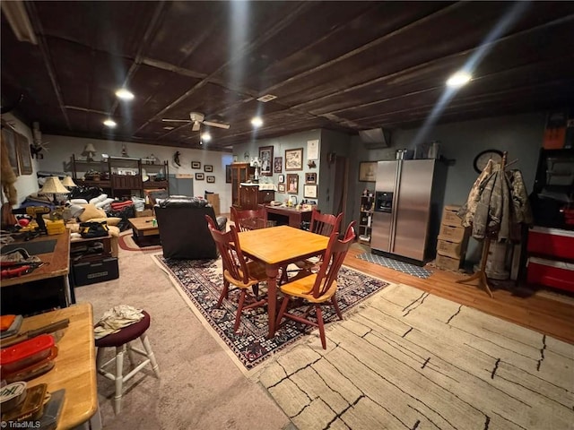 dining space featuring hardwood / wood-style floors and ceiling fan