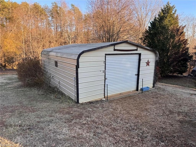 view of outbuilding featuring a garage