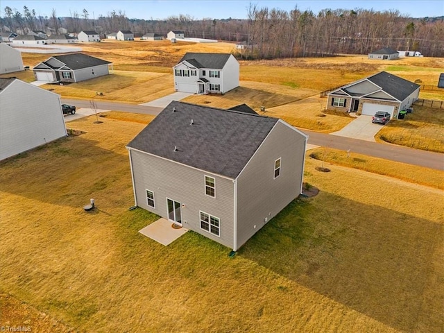 drone / aerial view with a residential view