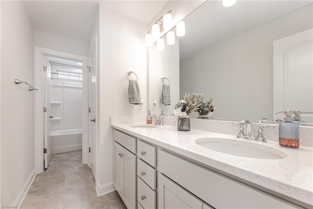 bathroom featuring vanity and shower / bath combination