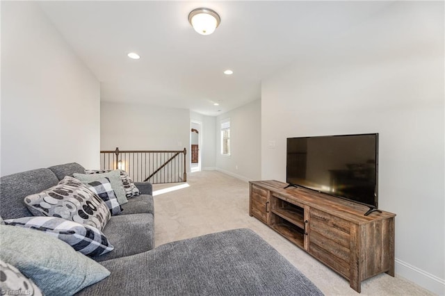 living room featuring light carpet