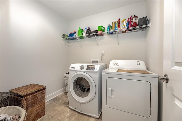 laundry area featuring washer and clothes dryer