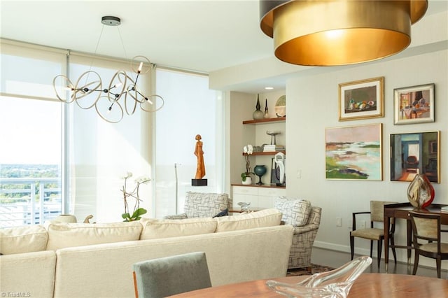 living room featuring a notable chandelier