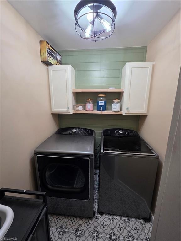 1030 Still Point Dr, Winston-Salem, NC 27103 - laundry area with washer and dryer and cabinet space