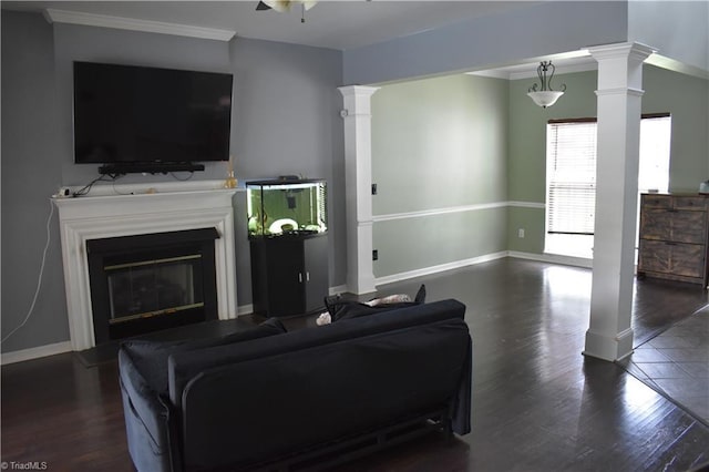 1030 Still Point Dr, Winston-Salem, NC 27103 - living room featuring ornate columns, wood finished floors, baseboards, and crown molding