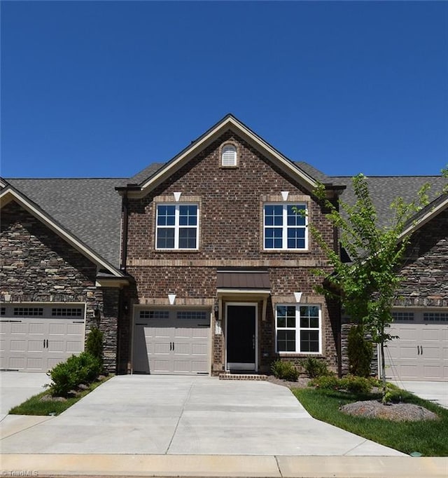 view of front of home featuring a garage