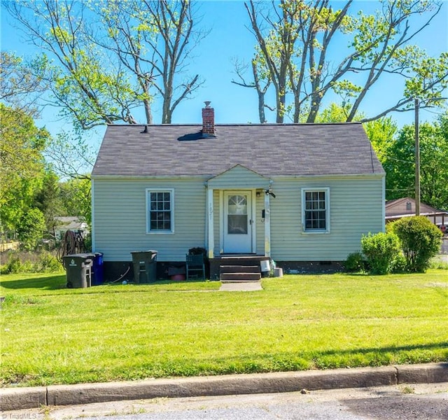 view of front of home featuring a front lawn