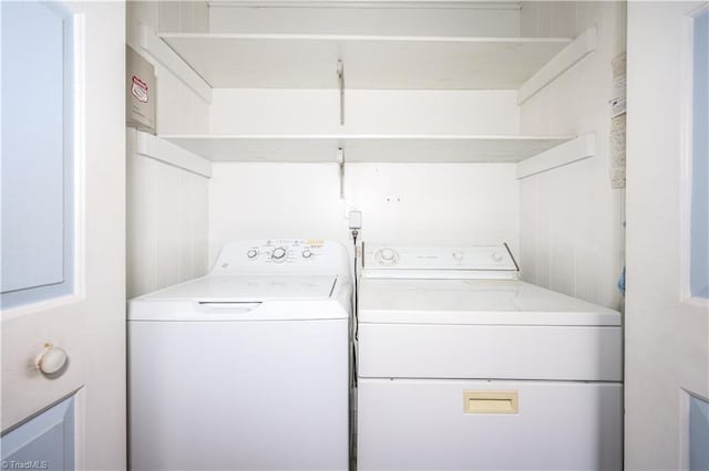 laundry room with washer and clothes dryer