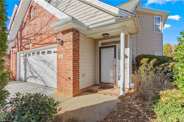 entrance to property with a garage