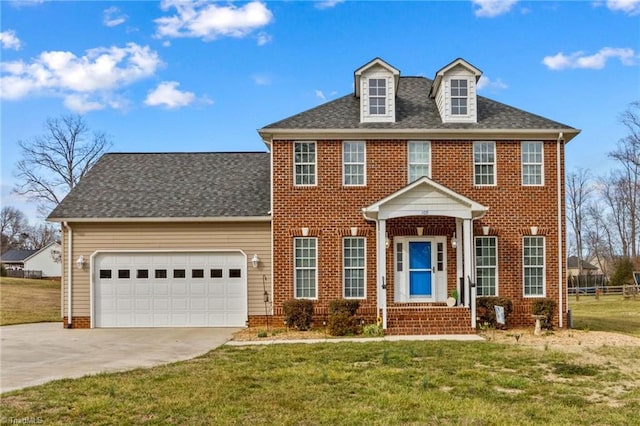 view of front facade featuring brick siding, a shingled roof, concrete driveway, a garage, and a front lawn