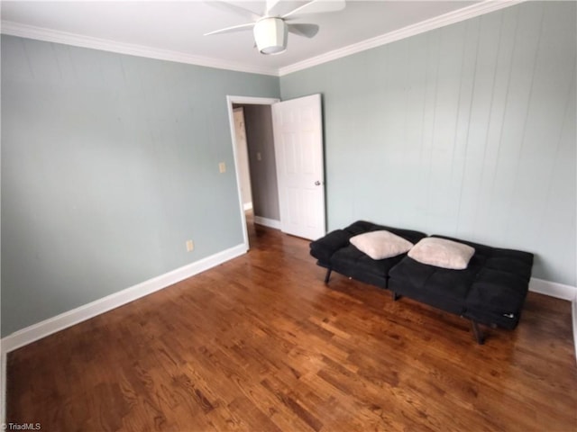 unfurnished room featuring crown molding, dark wood-type flooring, and ceiling fan