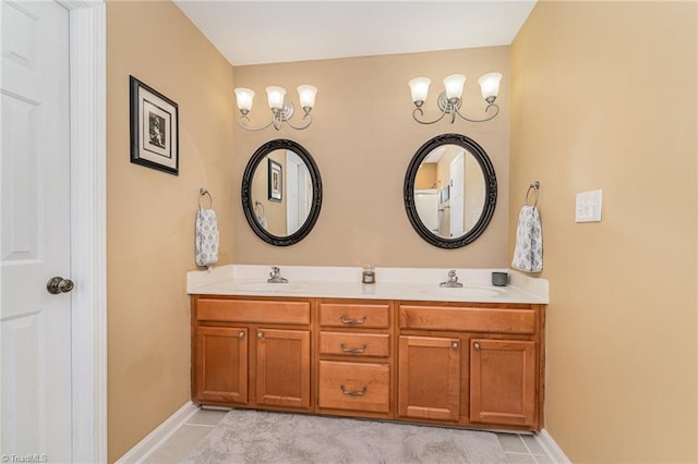 bathroom featuring tile patterned flooring and vanity