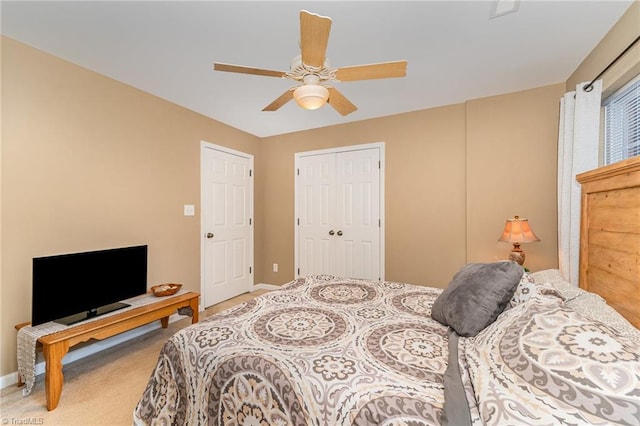 bedroom with carpet, a closet, and ceiling fan