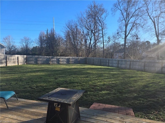 view of yard featuring a wooden deck