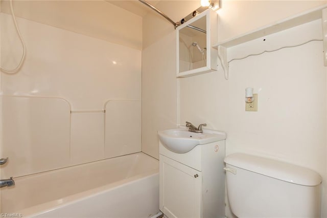 full bath featuring toilet, shower / washtub combination, and vanity