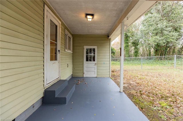 view of patio / terrace featuring fence