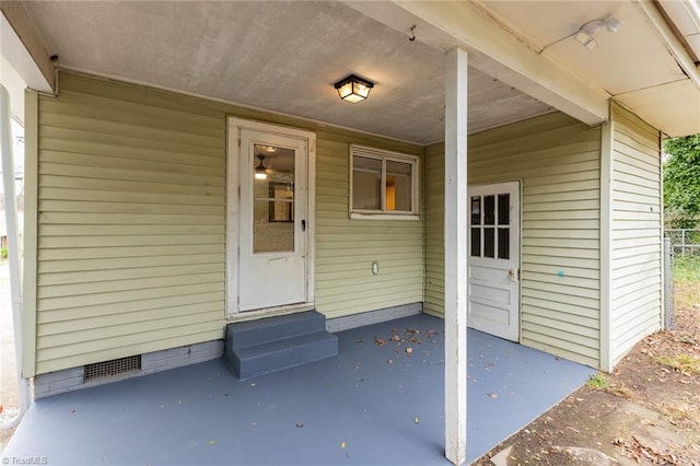 doorway to property featuring crawl space