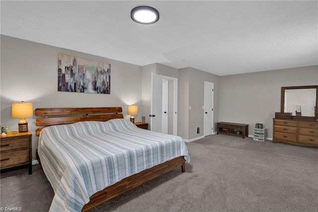 bedroom featuring baseboards and carpet flooring