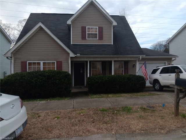 view of front of property with a garage