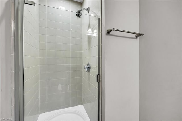 bathroom featuring walk in shower