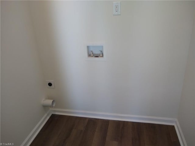 laundry area with dark hardwood / wood-style flooring, hookup for a washing machine, and hookup for an electric dryer