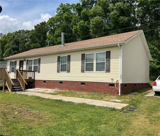 view of front of house with a front yard