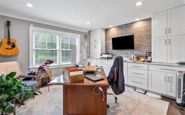 office area with crown molding and hardwood / wood-style flooring