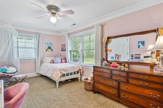 bedroom with carpet, multiple windows, and ceiling fan