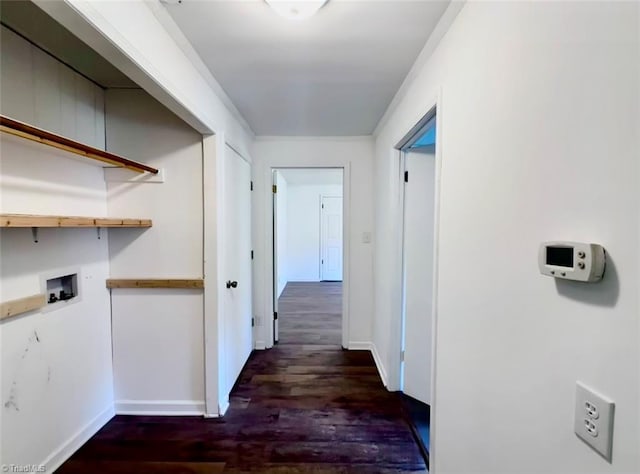 hall with dark wood-type flooring