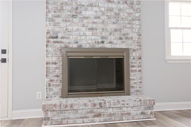 interior details featuring hardwood / wood-style floors