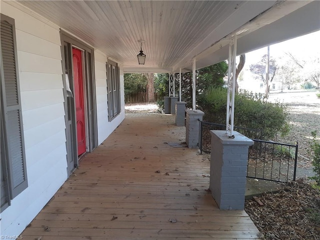 wooden deck featuring a porch