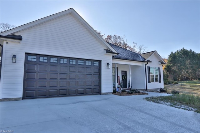 view of front of home with a garage