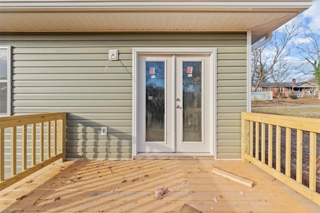 doorway to property with french doors and a wooden deck