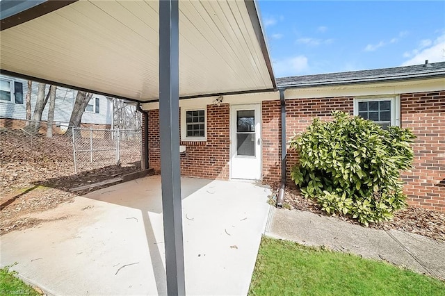 doorway to property featuring a patio area