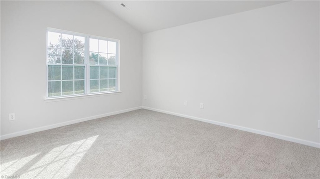1914 Frost Dr, Haw River, NC 27258 - carpeted empty room with vaulted ceiling and baseboards