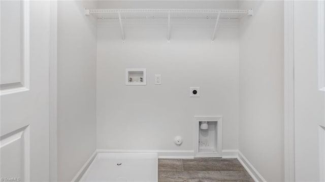 1914 Frost Dr, Haw River, NC 27258 - laundry room featuring gas dryer hookup, hookup for an electric dryer, washer hookup, and wood finished floors