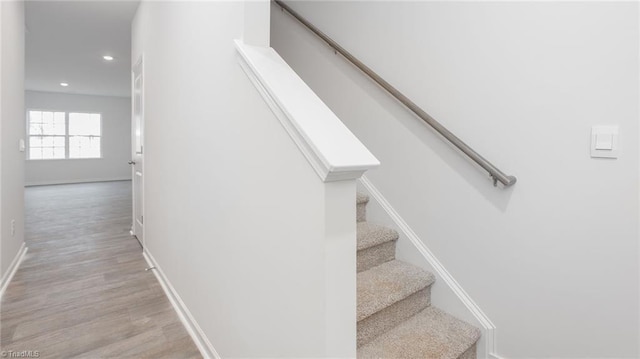 1914 Frost Dr, Haw River, NC 27258 - stairway with recessed lighting, wood finished floors, and baseboards