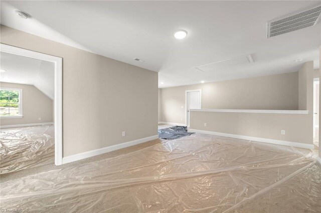 6969 Orchard Path Dr, Clemmons, NC 27012 - unfurnished room featuring attic access, vaulted ceiling, a smoke detector, and recessed lighting