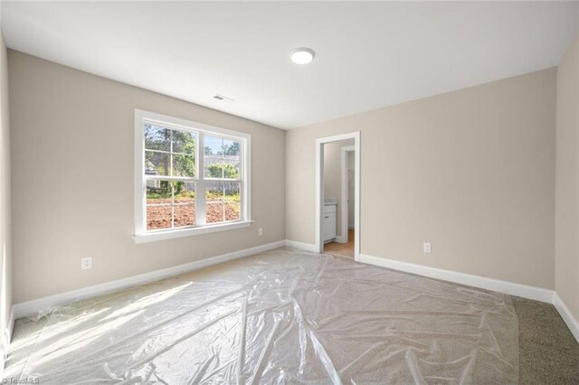 6969 Orchard Path Dr, Clemmons, NC 27012 - empty room featuring baseboards and light carpet