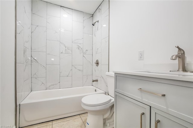 full bathroom with tile patterned floors, vanity, toilet, and tiled shower / bath